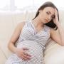 Zakaj vas med nosečnostjo boli trebuh?