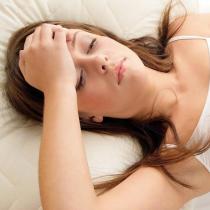 Защо ме болят гърдите по време на менструация?